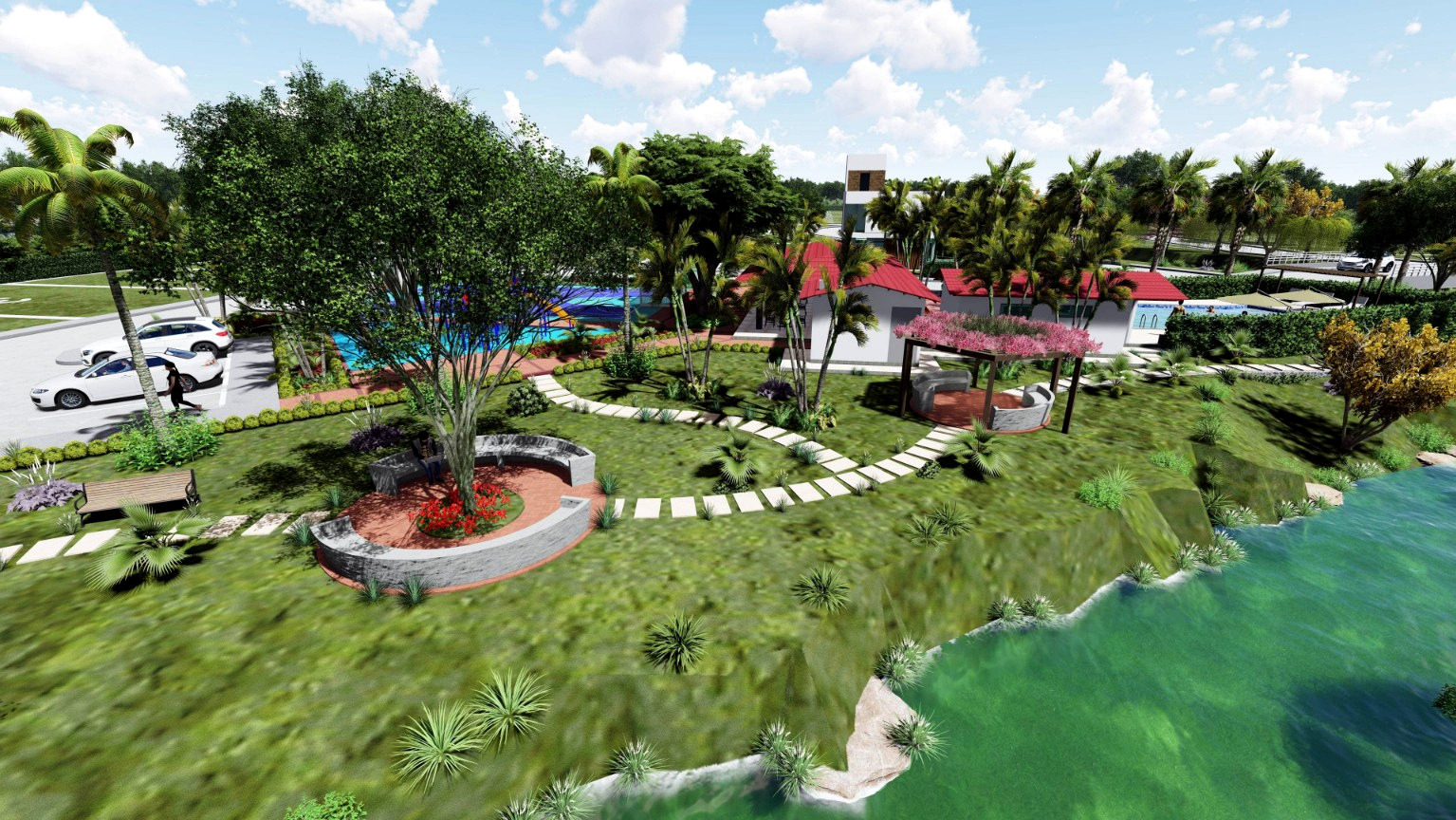 Zona verde con senderos, mobiliario y vista al lago